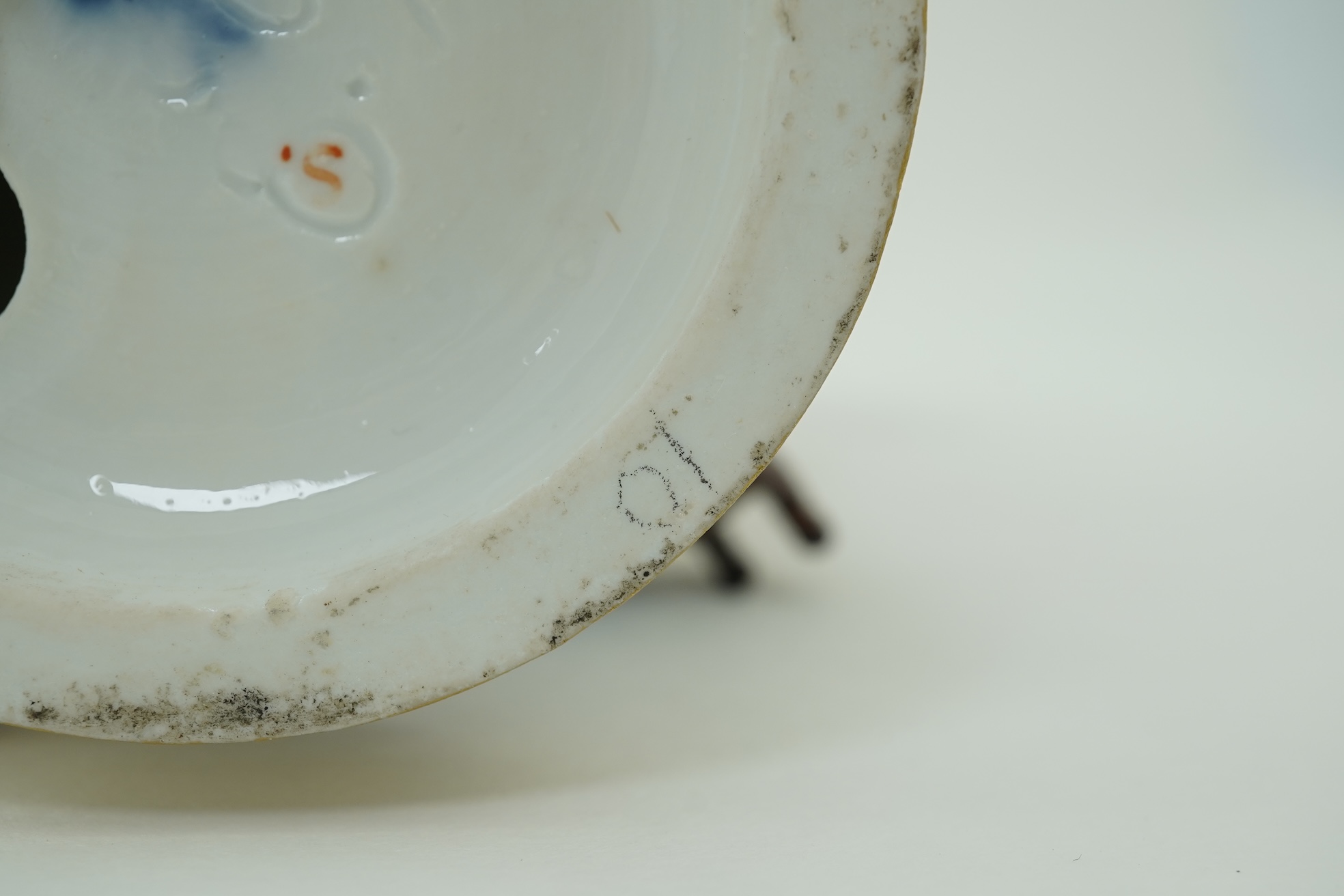 A Meissen figure of a boy on a hobby horse, 19th century